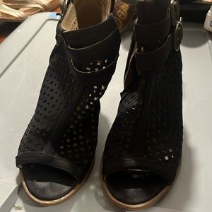 Gently used zip up sandals with heel